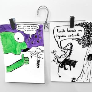 Kaksi nuorten tekemää sarjakuvatyylistä kuvitusta roikkuu housuhenkarista