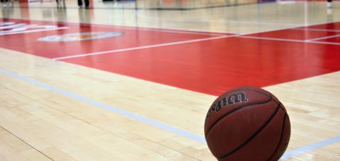 Basketball on the gym floor.