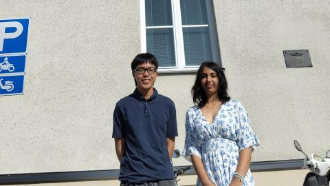 Two students standing in the courtyard of Pyynikki High School.