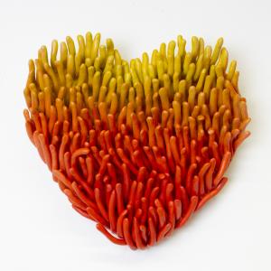 Auringonlaskun sydän sydämenmuotoinen taideteos