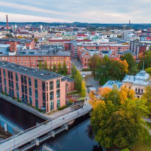 Aerial view of Tammerkoski and the buildings around it in the Finlayson area of Tampere.