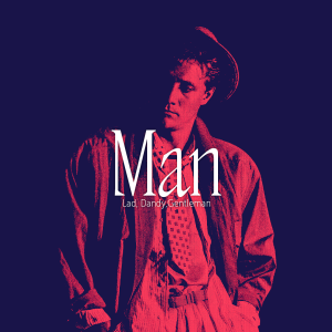 A man in the middle of the picture in red, the background is dark.