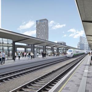 Havainnekuva rautatieasemalta Tampereen henkilöratapiha -hankkeen valmistuttua. Laitureilla näkyy uudet katokset.