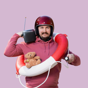 A bearded man with a helmet on, a radio on his shoulder and a life ring around his neck.