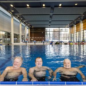 Kimmo Leinonen, Erkki Räsänen, Juha Lindgren, Harri Kanto and Seppo Asp are in the pool at Tampere Swimming Centre.