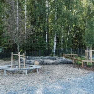 The playground at Metsäniitty Early Childhood Education and Care Centre in the summer.