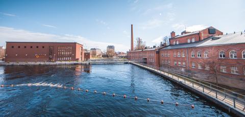 Tammerkoski rapids and the red brick buildings of the power plant and Frenckell.