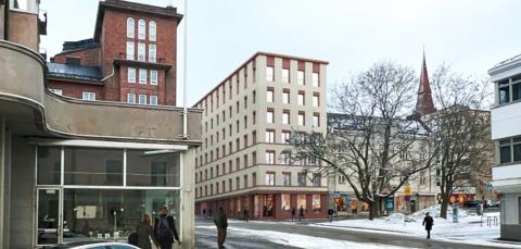 Kuvassa vanhaa kaupunkirakennetta ja uusi talo.