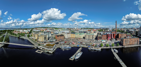 Aerial view of Tampere city center, with Ratina Bay and Laukontori Square in the foreground.