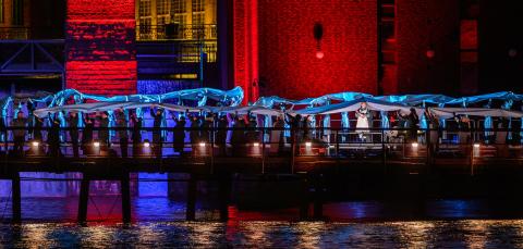 Festival of Light chamber opera Her Voice performers on the temporary bridge at Tammerkoski rapids.
