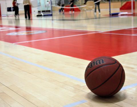 Basketball on the gym floor.