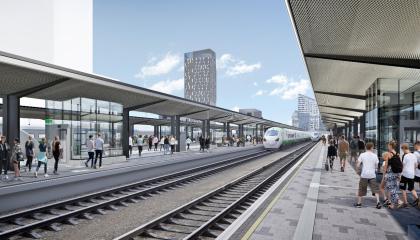 Havainnekuva rautatieasemalta Tampereen henkilöratapiha -hankkeen valmistuttua. Laitureilla näkyy uudet katokset.