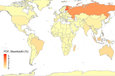 A world map with the land use impact highlighted in orange. 