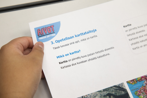 This page of the learning material teaches map reading skills.