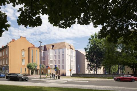 Kuvassa vanhoja kerrostaloja, keskellä uusi saman korkuinen.