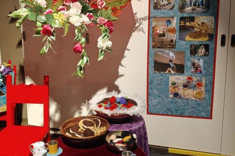 Flowers and red umbrella in Rulla's party office