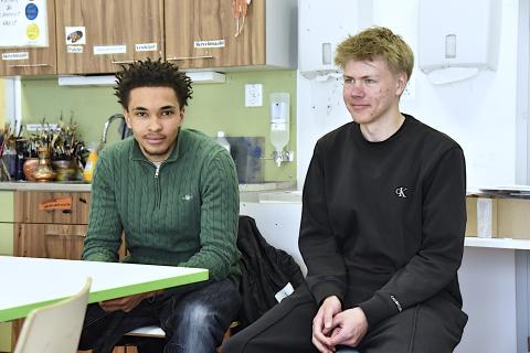 Jimi Hevonoja and Eerik Kautto sitting at a table.